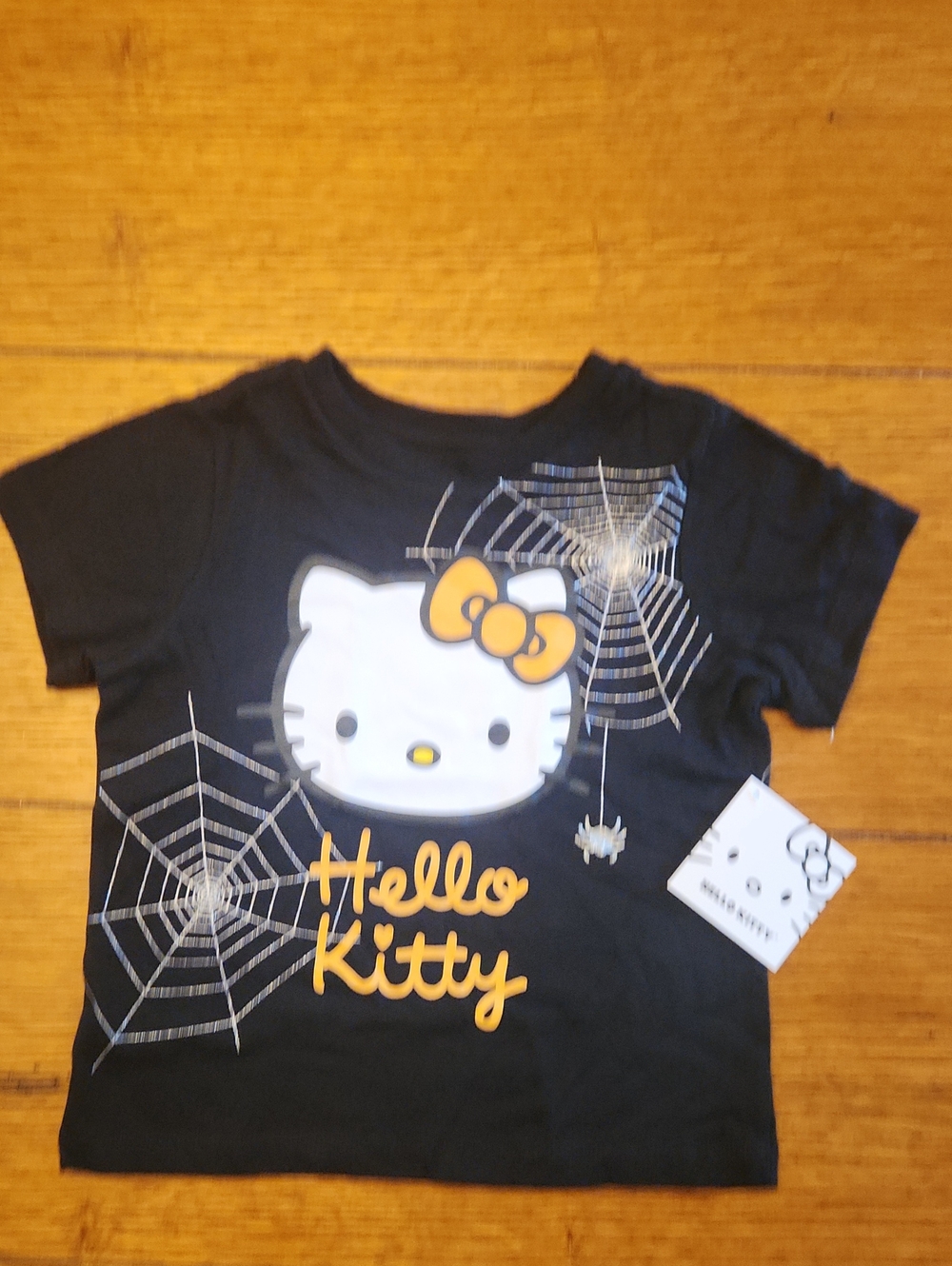 Hello Kitty Black Tee with White Face and Yellow Bow Accent